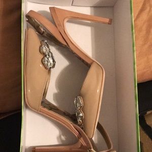 Sling back pumps with rhinestones.